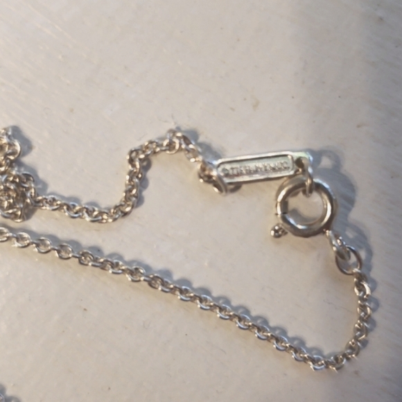 Tiffany & Co. Italian sterling 16" chain with signature diamond-shape charm. - Picture 6 of 7